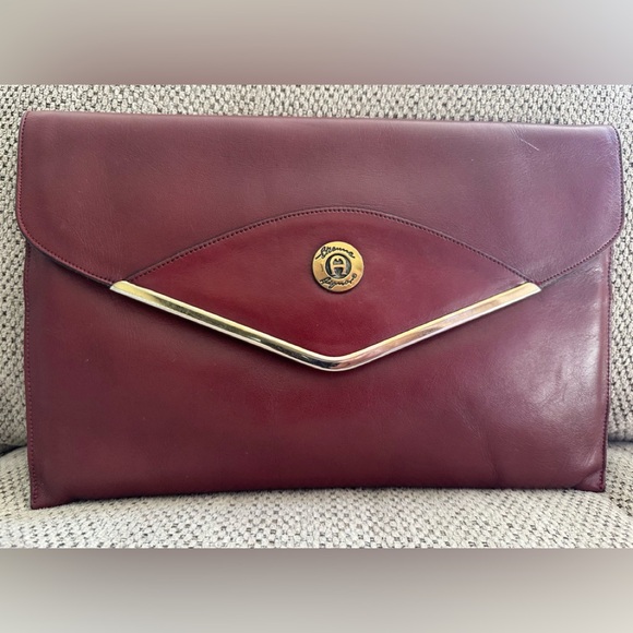 Etienne Aigner Handbags - Etienne Aigner leather w Gold Trim & Logo-great condition! Great for fall!